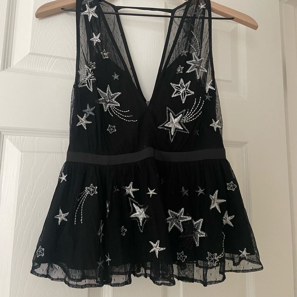 Embroidered metallic star top